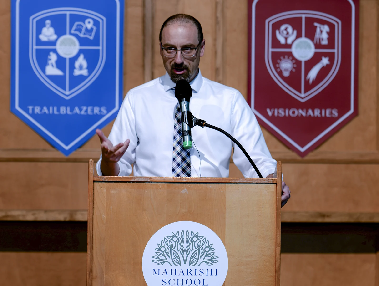 Brett Potash, Head of School, greeting a student