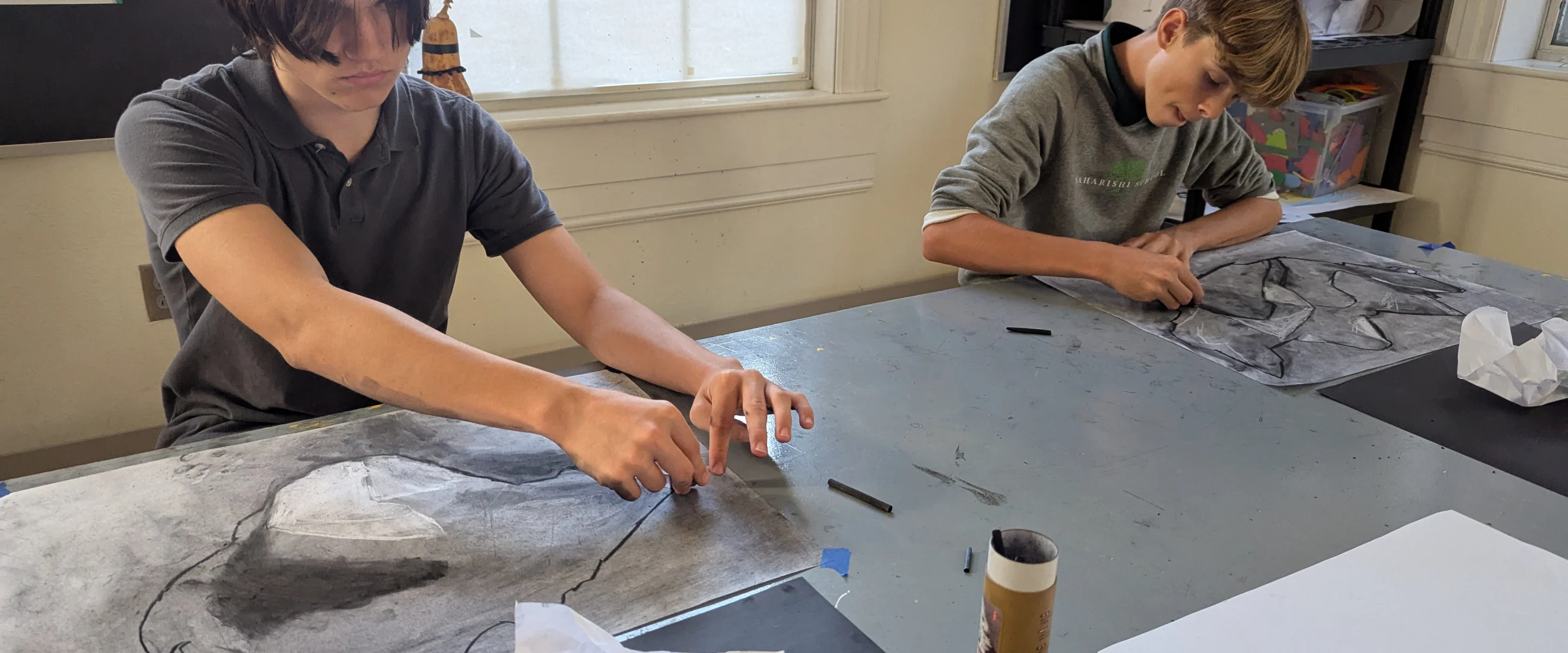 Students working on an art project together