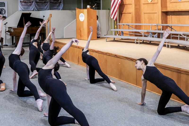 Students performing on stage