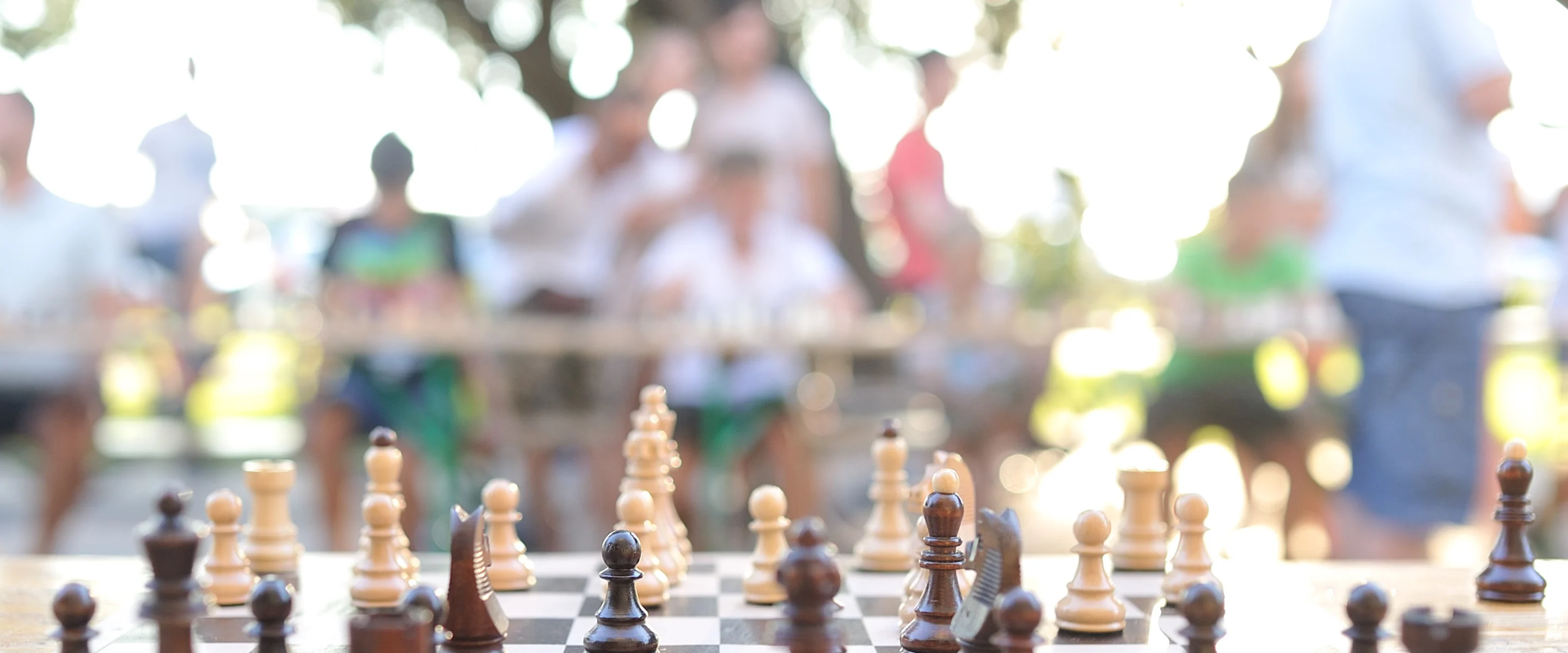 Students playing chess together