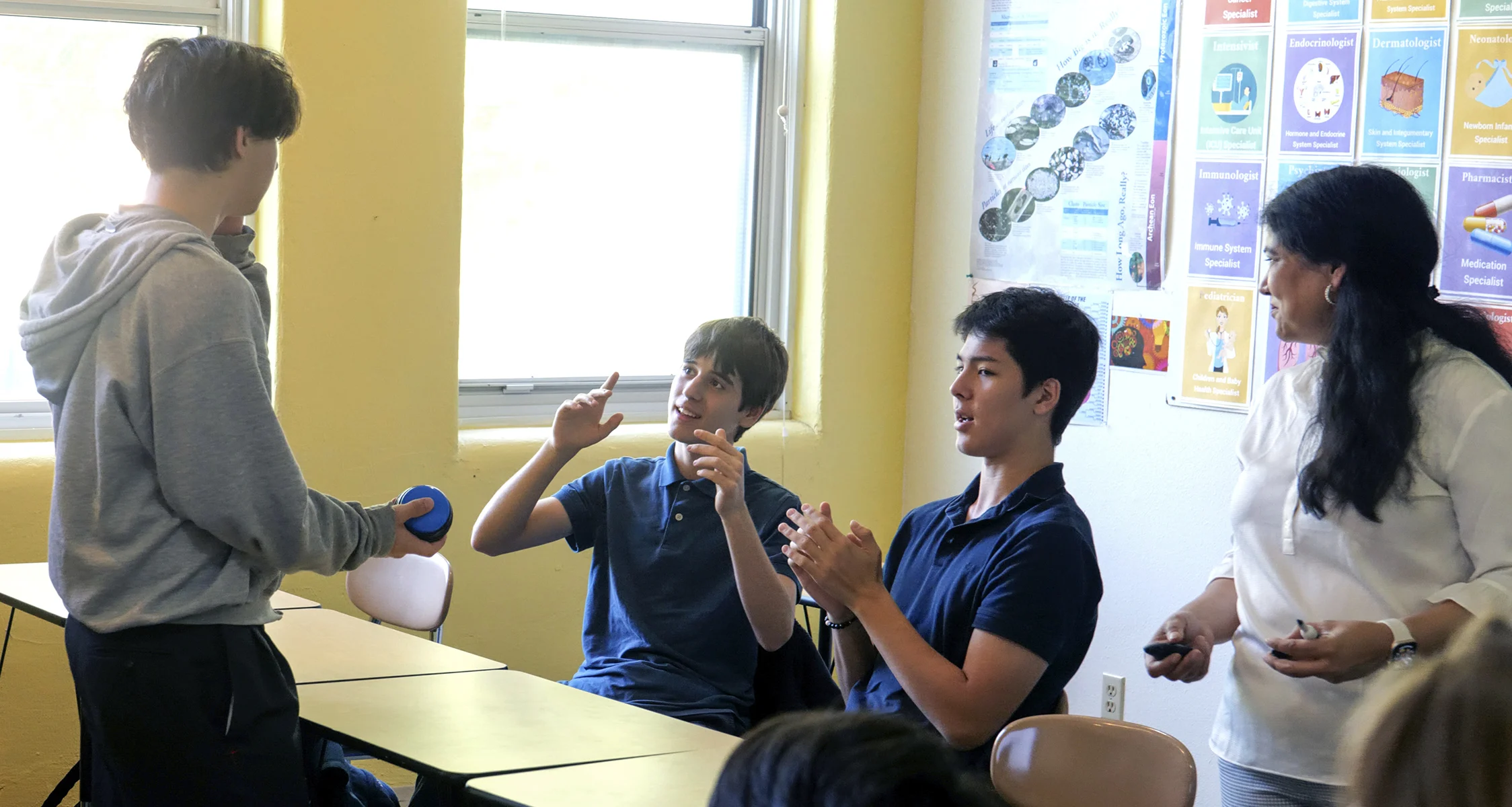 Students in a debate club discussion