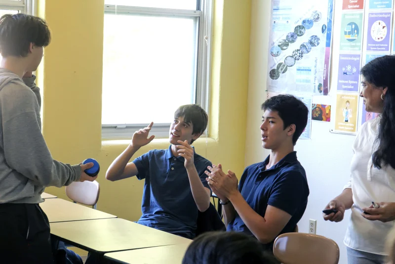 Students in a debate club discussion