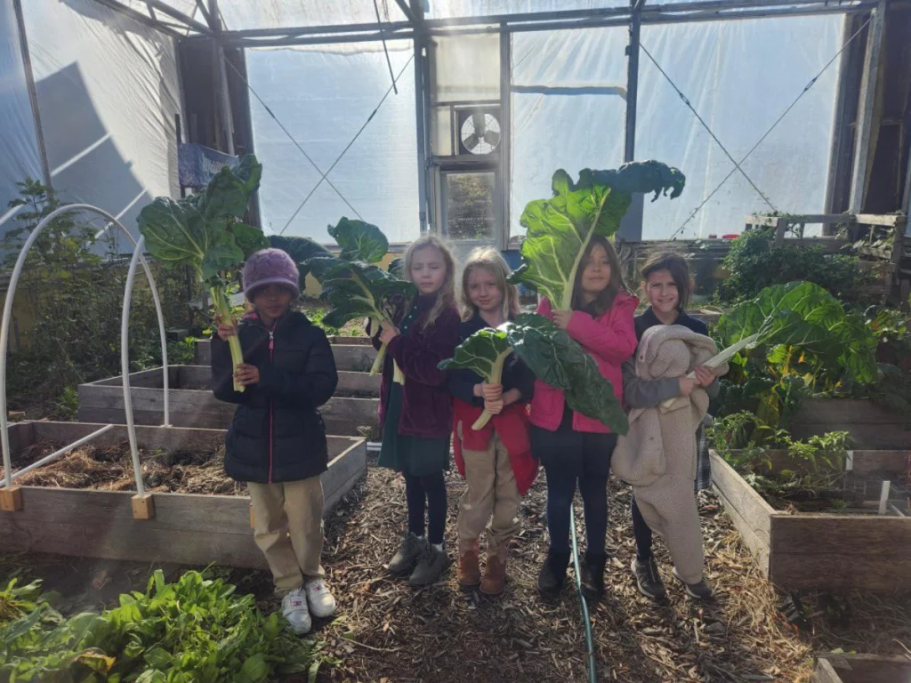 Elementary School students in the garden