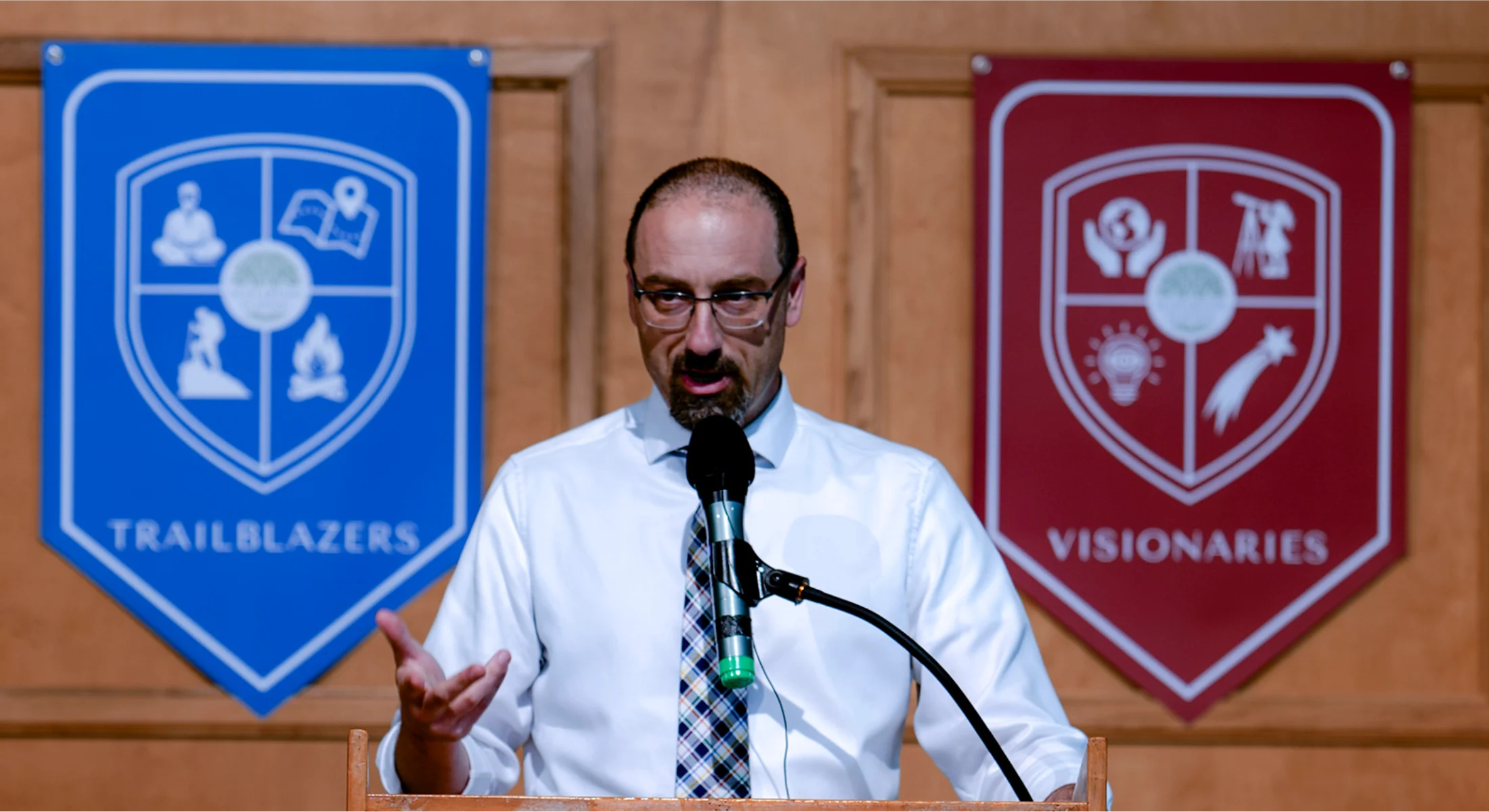 Brett Potash, Head of School, greeting a student
