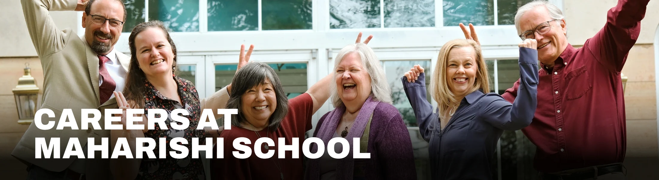Careers at Maharishi School. Five faculty and staff laugh together outdoors. Explore careers.