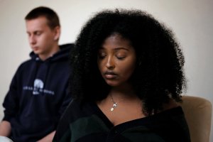 students meditate