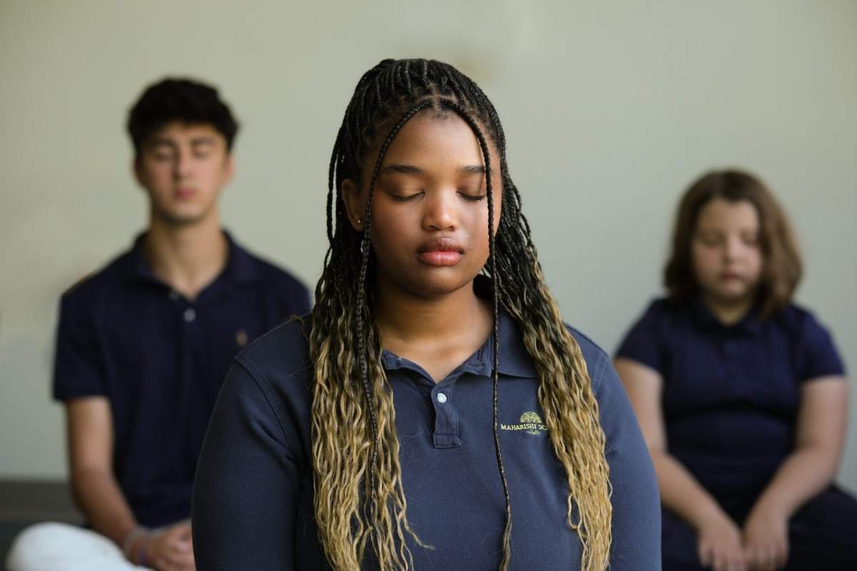 Upper school students in meditation