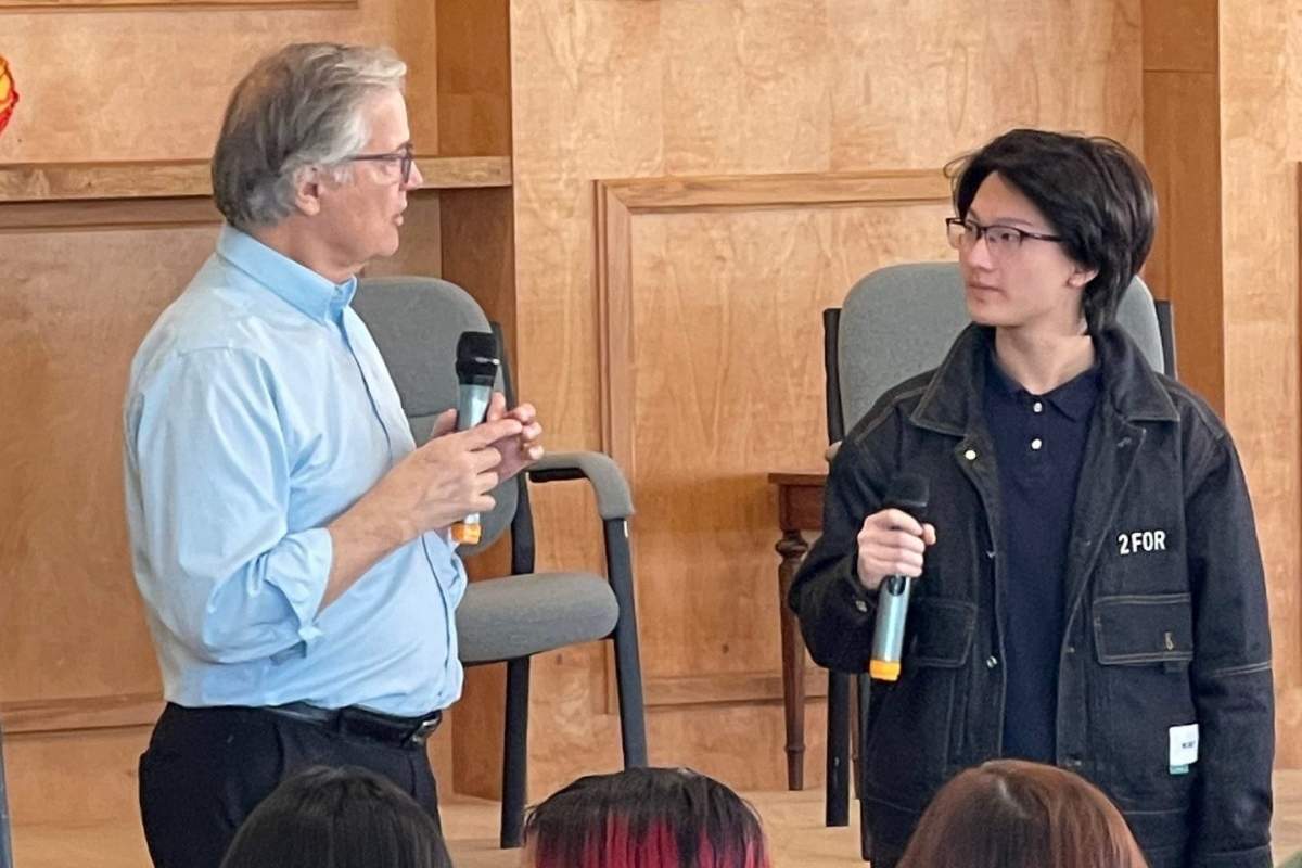 dr beall with student at assembly