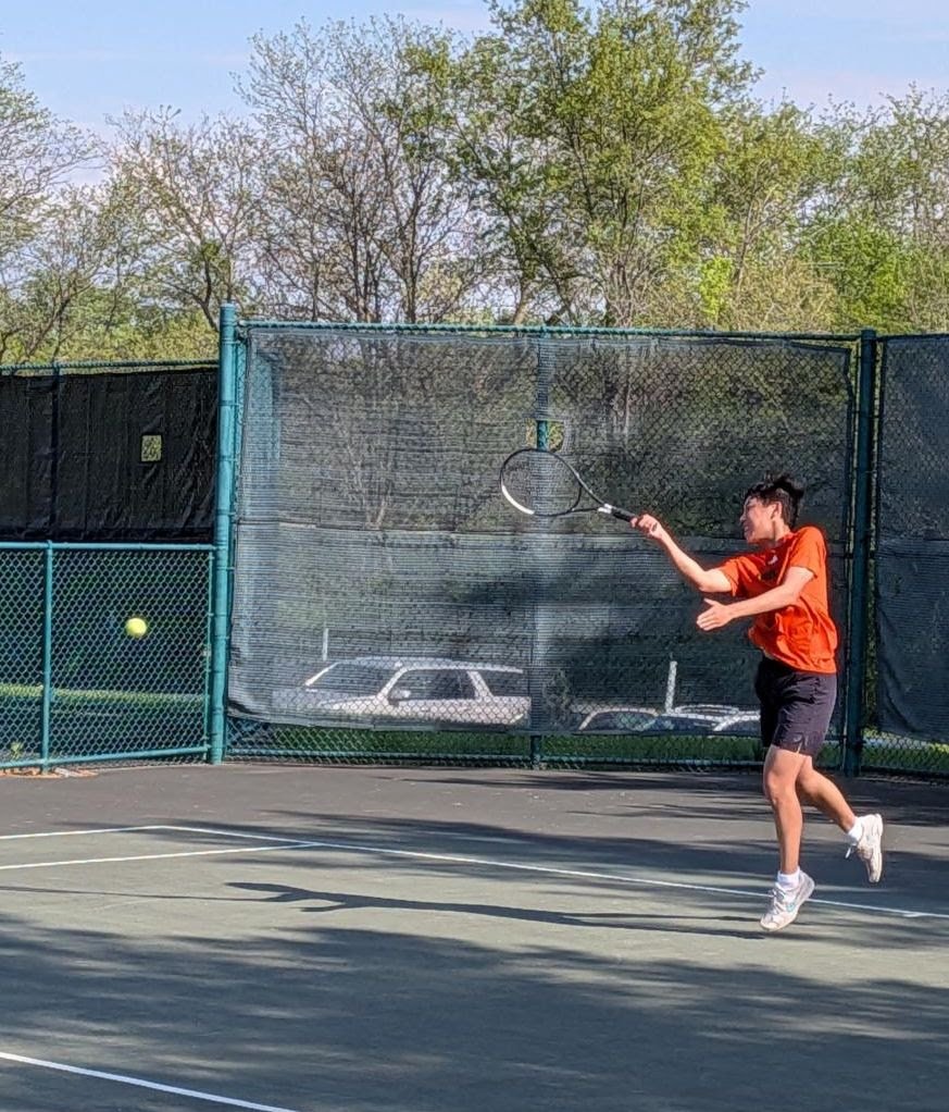 Upper school tennis student winning state